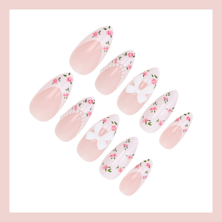 Artificial nail set with romantic flower motifs and elegant details Kalsten