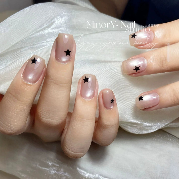 Artistic Press-On Nail Set with Star Designs Kalsten