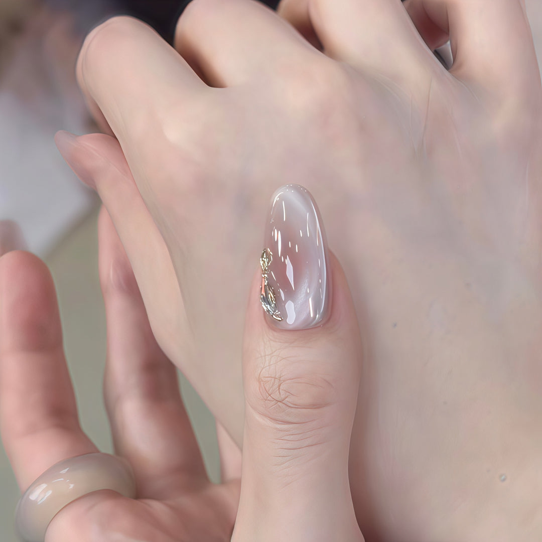 Glamorous artificial nails with rhinestone embellishments Kalsten