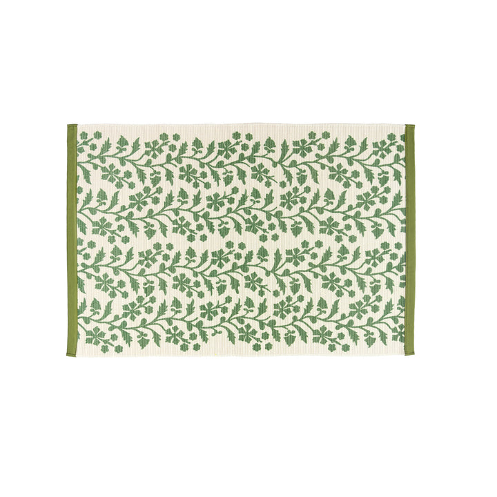 Woven table runner with floral vinyl print look and reinforced overlock stitching Kalsten