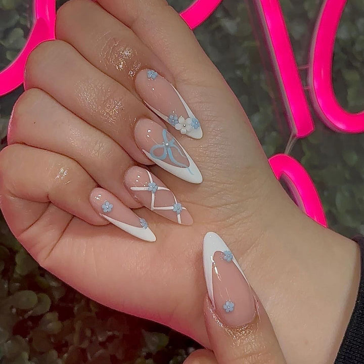 Acrylic nail set with elegant 3D flowers and glamorous accents Kalsten