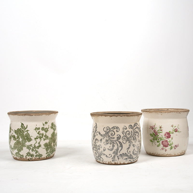 Decorative ceramic plant container with artistic design Kalsten