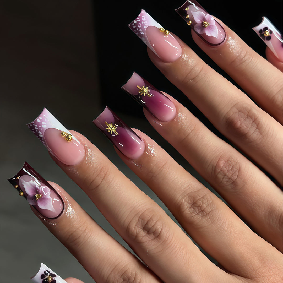 Artistic Acrylic Nail Design Set with Floral and Gold Accents Kalsten