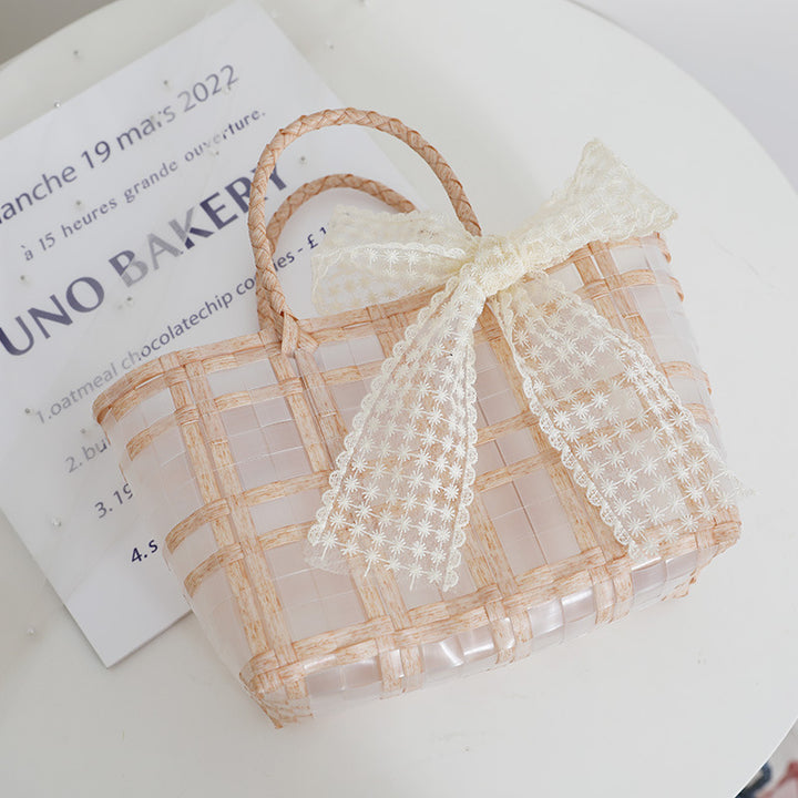 Handcrafted basket bag with elegant bow applique Kalsten