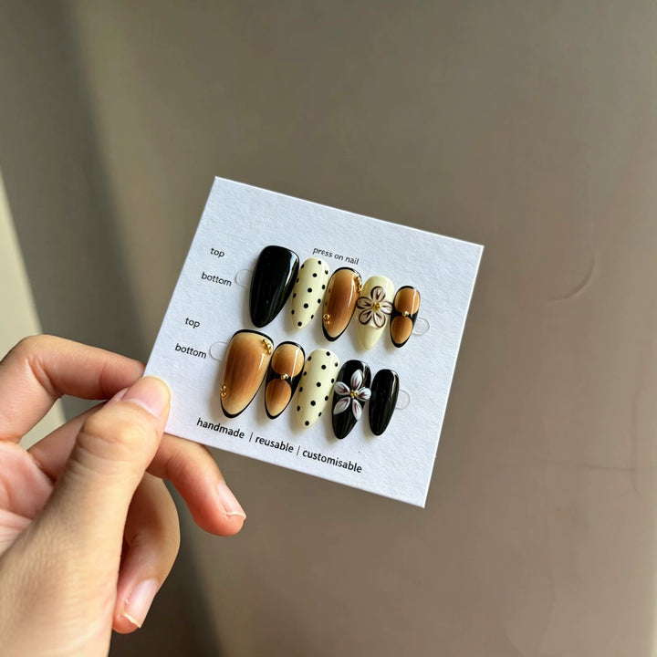 Artistic Press-On Nail Set with Reusable Floral and Polka Dot Designs