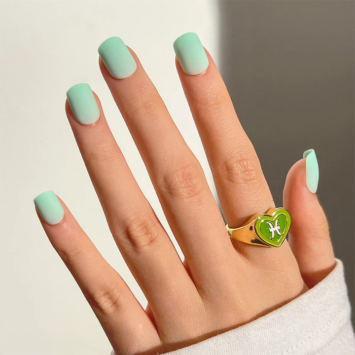 Fashionable nail art with matte finish and heart design Kalsten