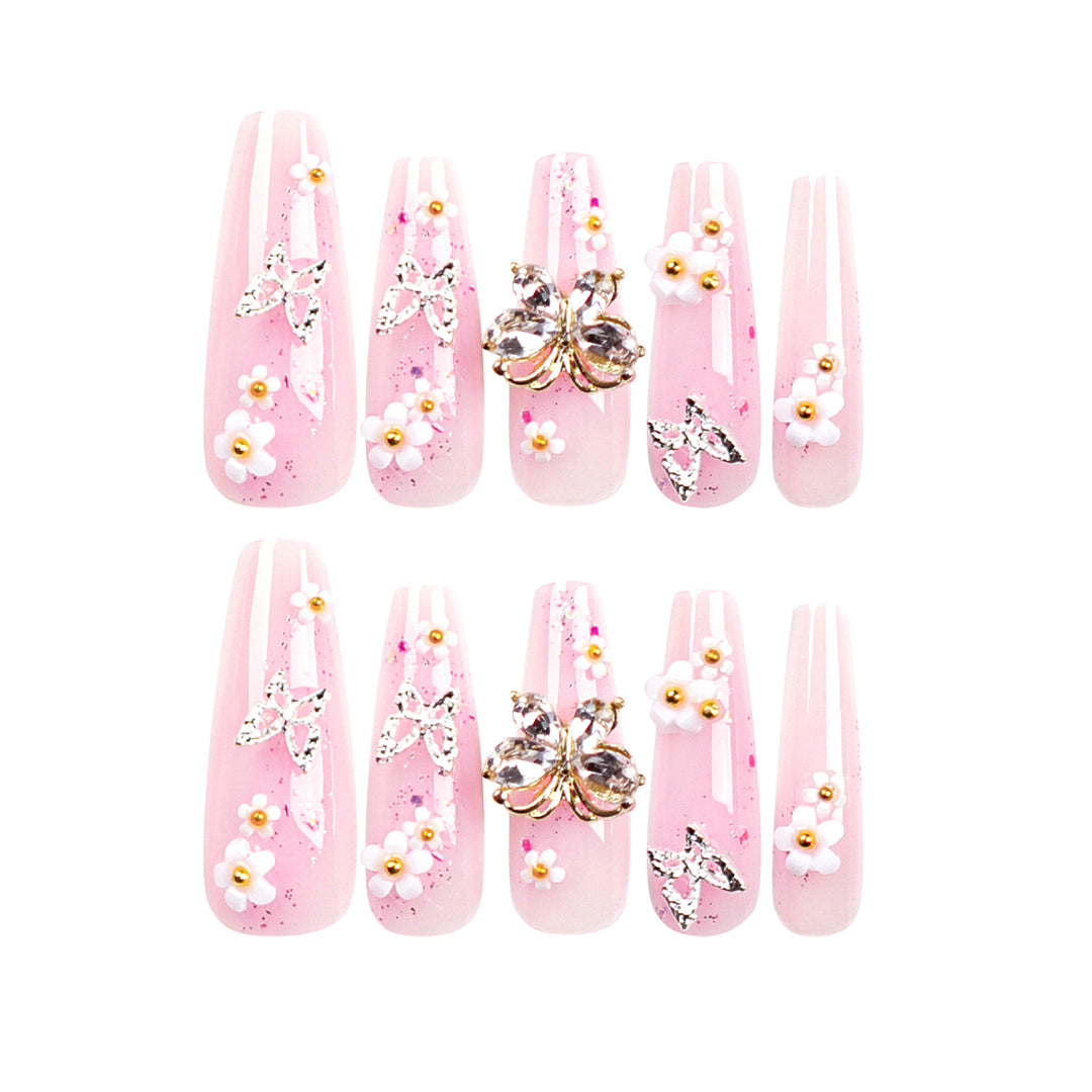 Artistic Nail Extensions with Glitter and Floral Accents Kalsten