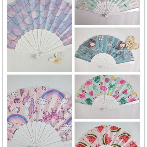 Women folding hand fan with shimmering scale pattern Kalsten
