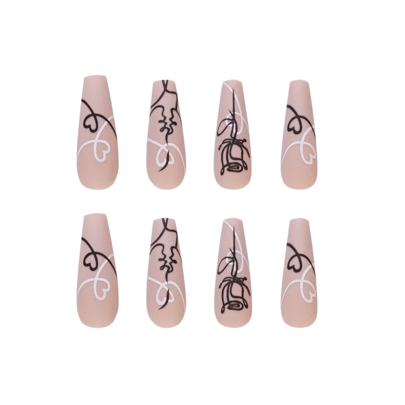 Artful nail extensions with creative line and heart design Kalsten