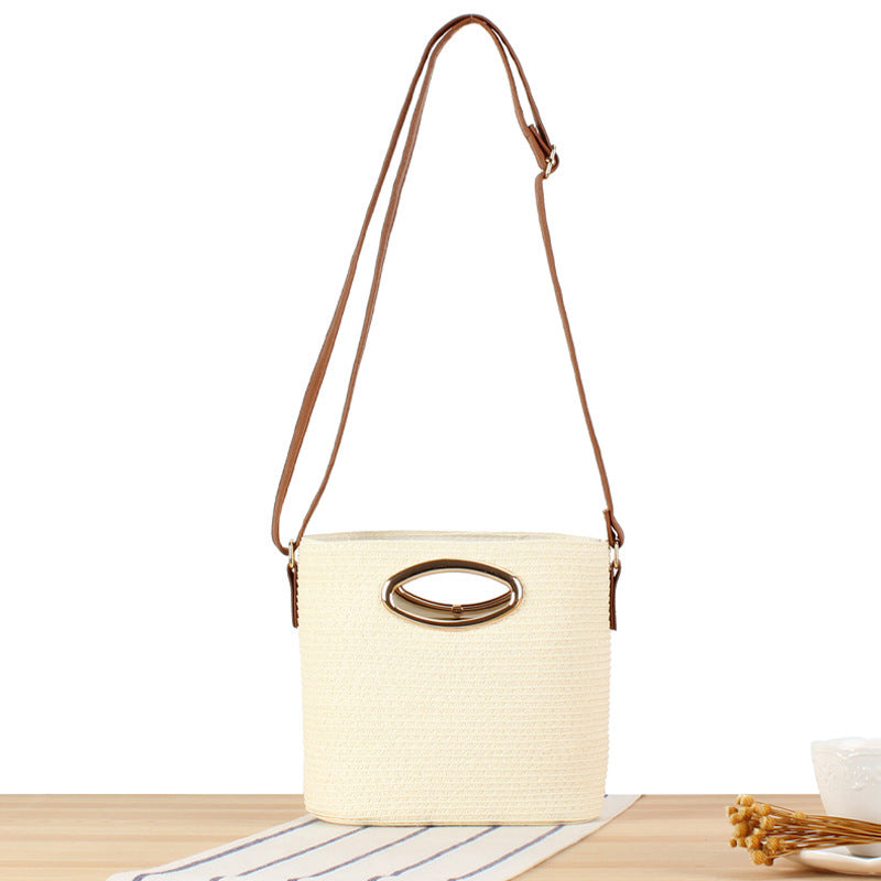 Shoulder bag made of hand-woven natural material with elegant ring closure Kalsten