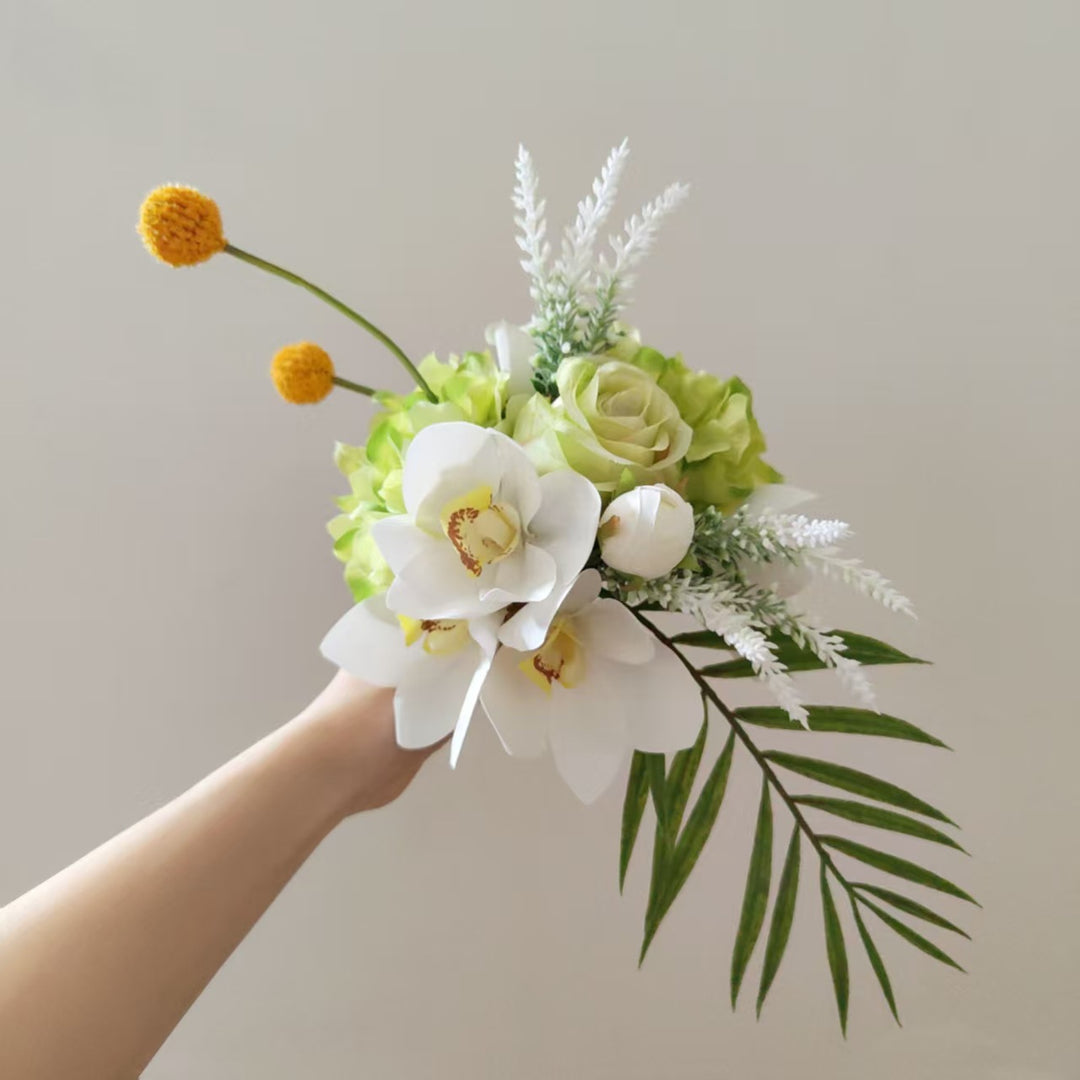 Lifelike Floral Arrangement with Orchids and Greenery