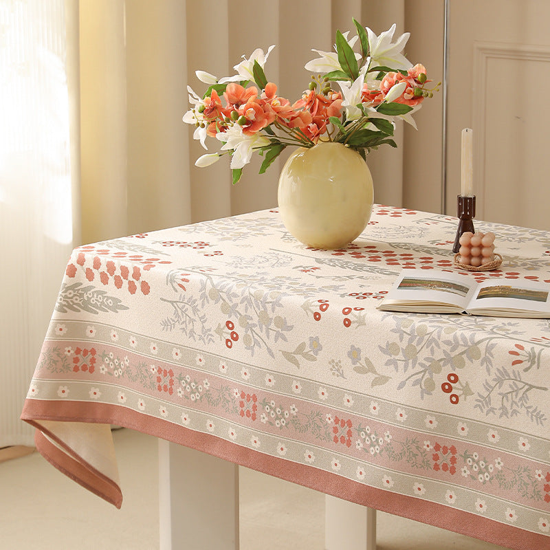 Rectangular easy-care tablecloth in floral jacquard with decorative border Kalsten