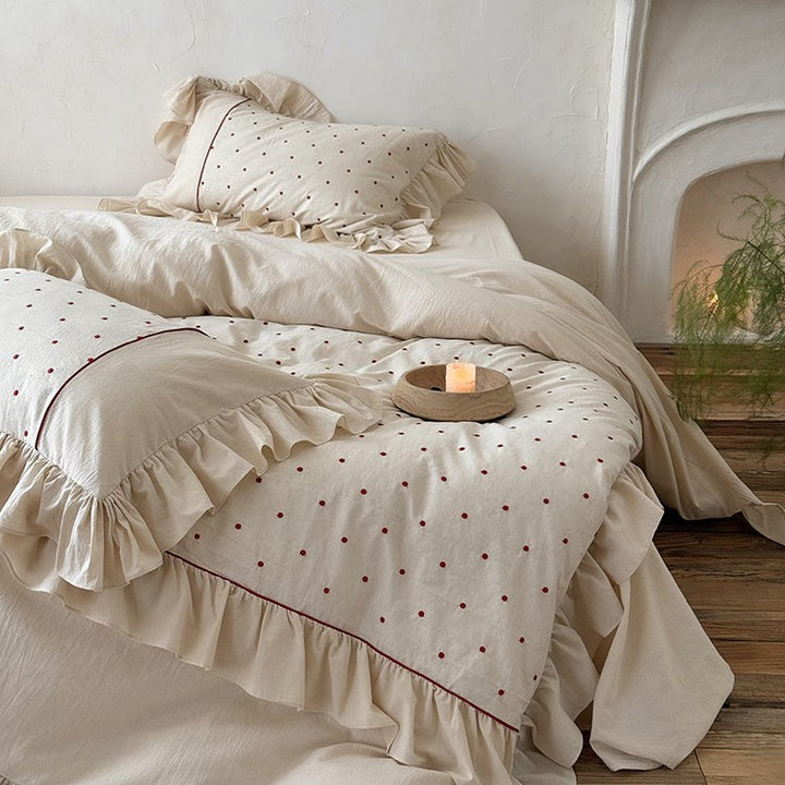 Duvet cover set with ruffle, embroidered dots, and stonewashed cotton finish