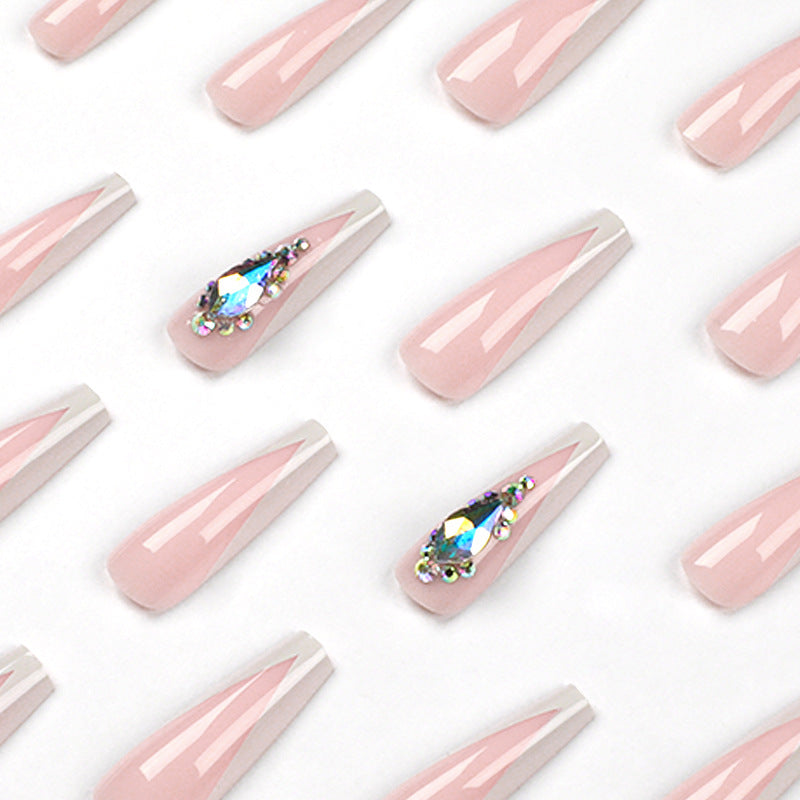 Artful nail extensions with elegant glitter accents Kalsten