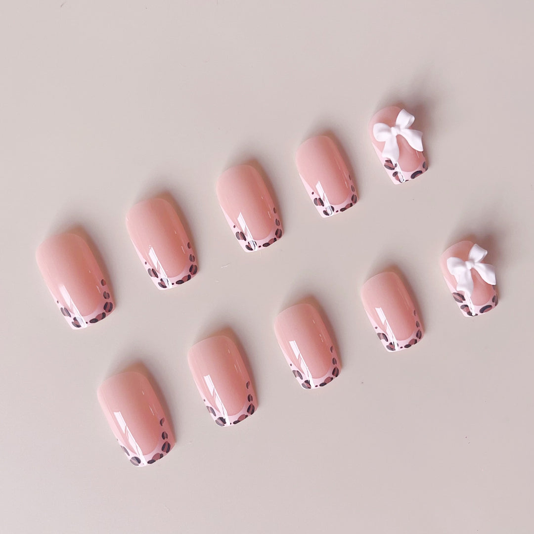 Artificial nails with leopard pattern and bows Kalsten