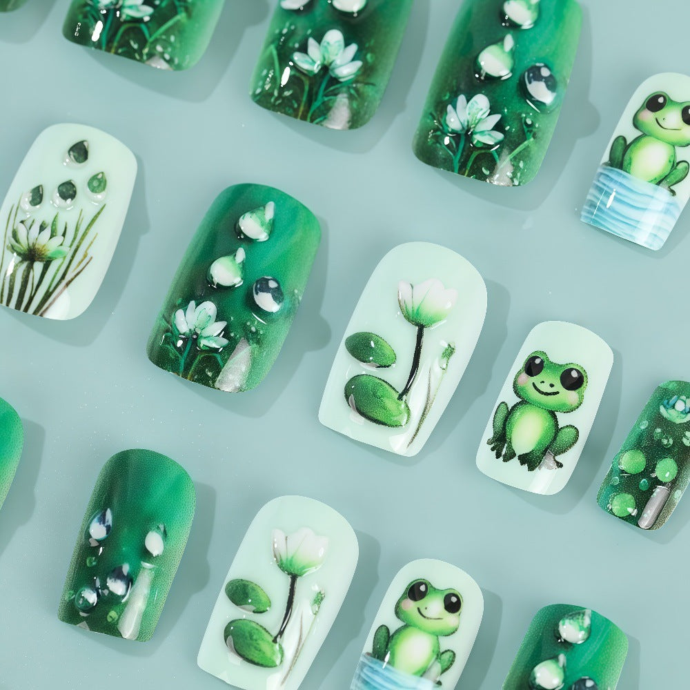 Creative art nails with frogs and plant details Kalsten