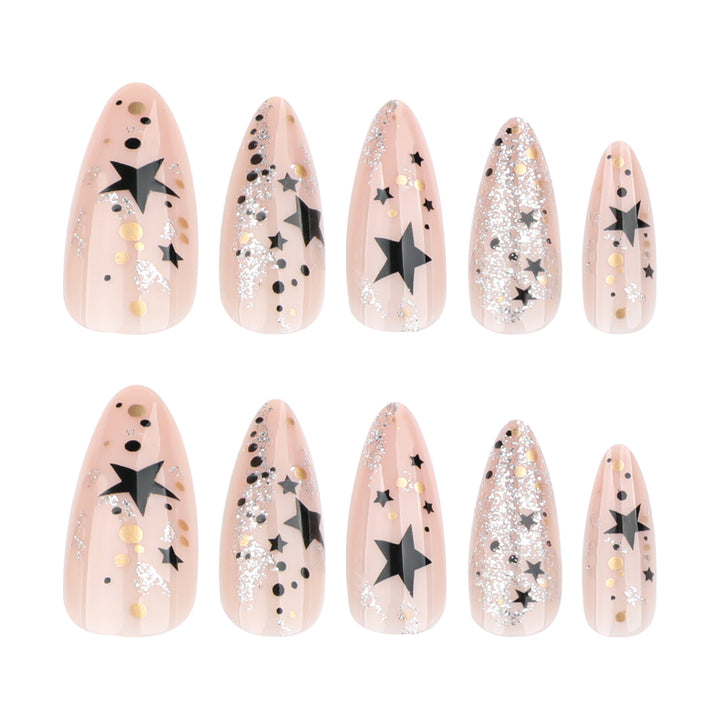 Artistic stiletto nails with glitter and star design Kalsten