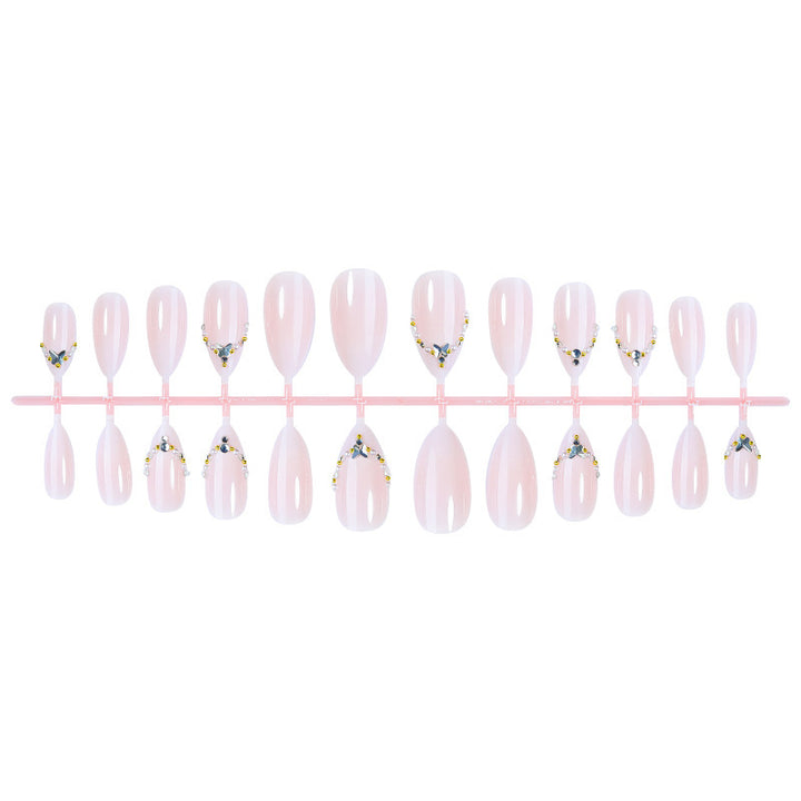 Acrylic nail set with elegant rhinestone decorations and glamorous designs Kalsten