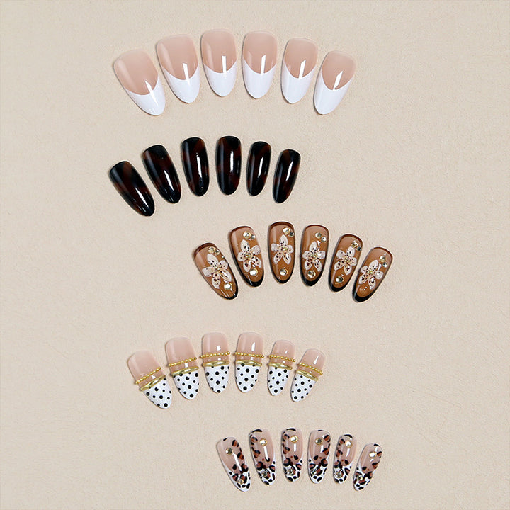 Exquisite nail art with elegant embellishments Kalsten