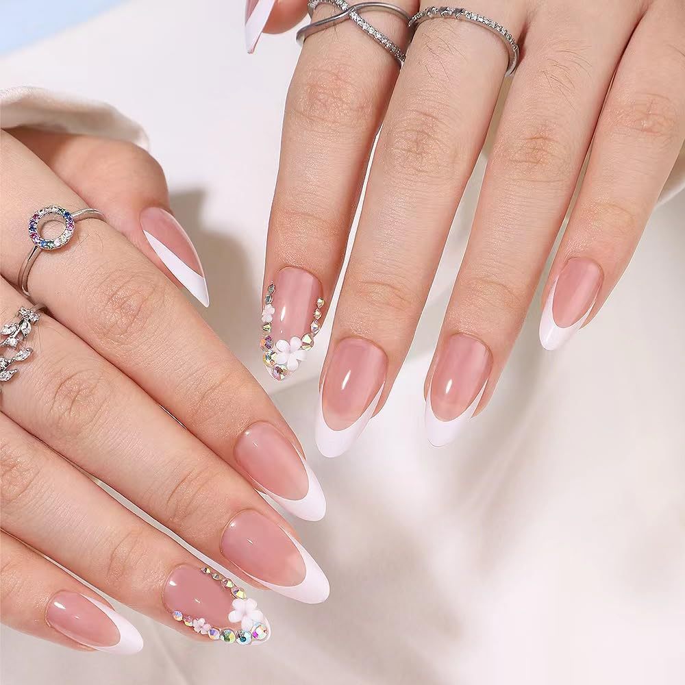 Artificial nails with elegant French tips and rhinestone details Kalsten