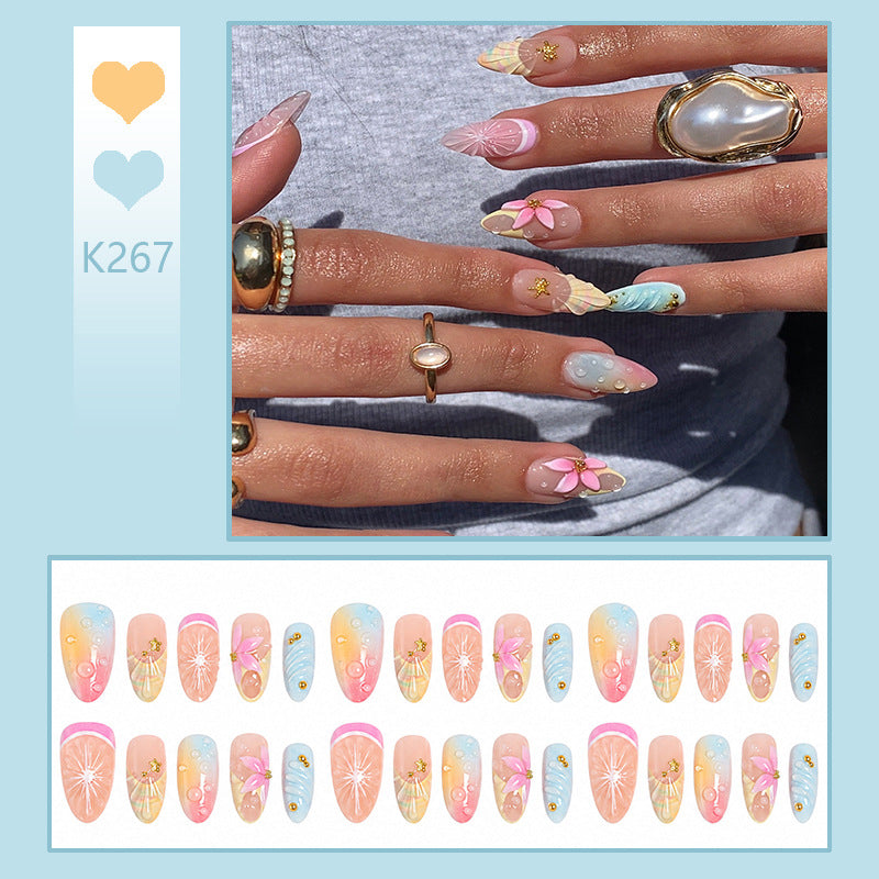 Artificial nail set with elegant floral design and glitter accents Kalsten
