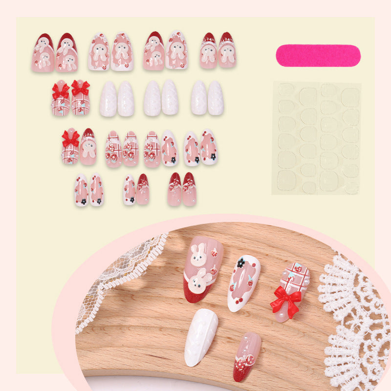 Creative acrylic nail set with playful bunny and gift designs Kalsten
