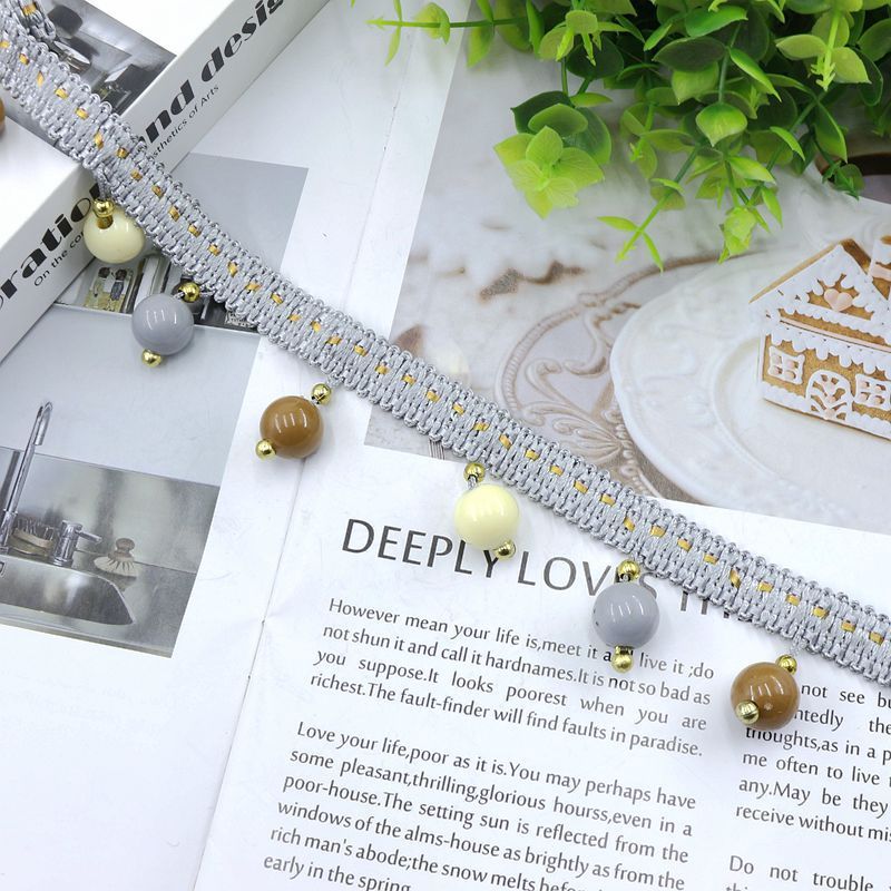 Decorative lace trim with colorful pendants Kalsten