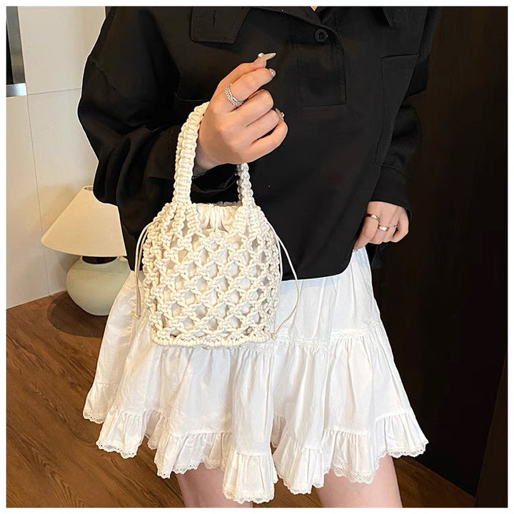 Fashionable handbag made of braided material Kalsten