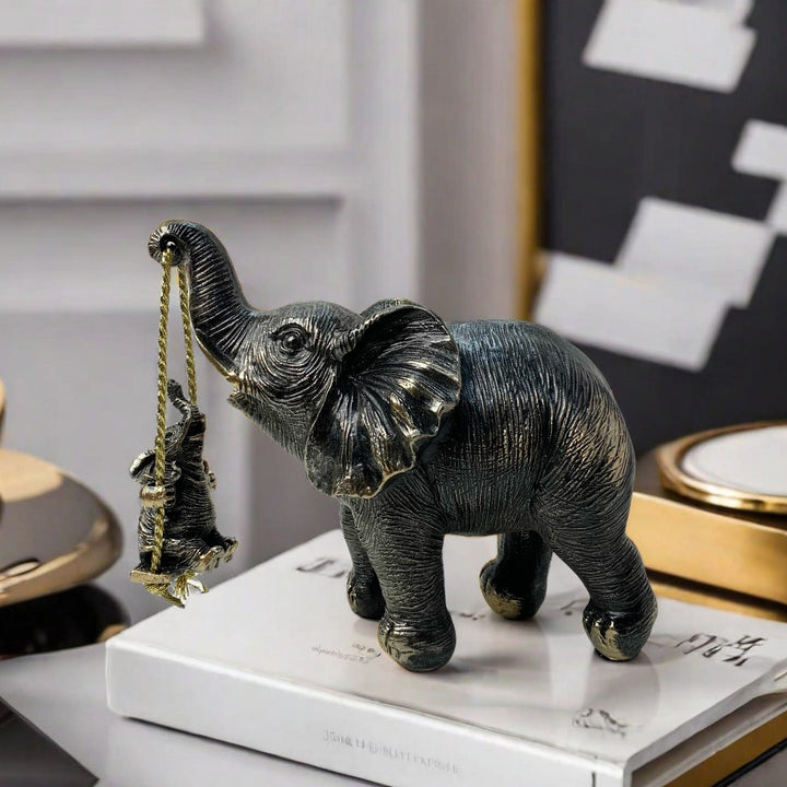 Decorative elephant figure with child Kalsten