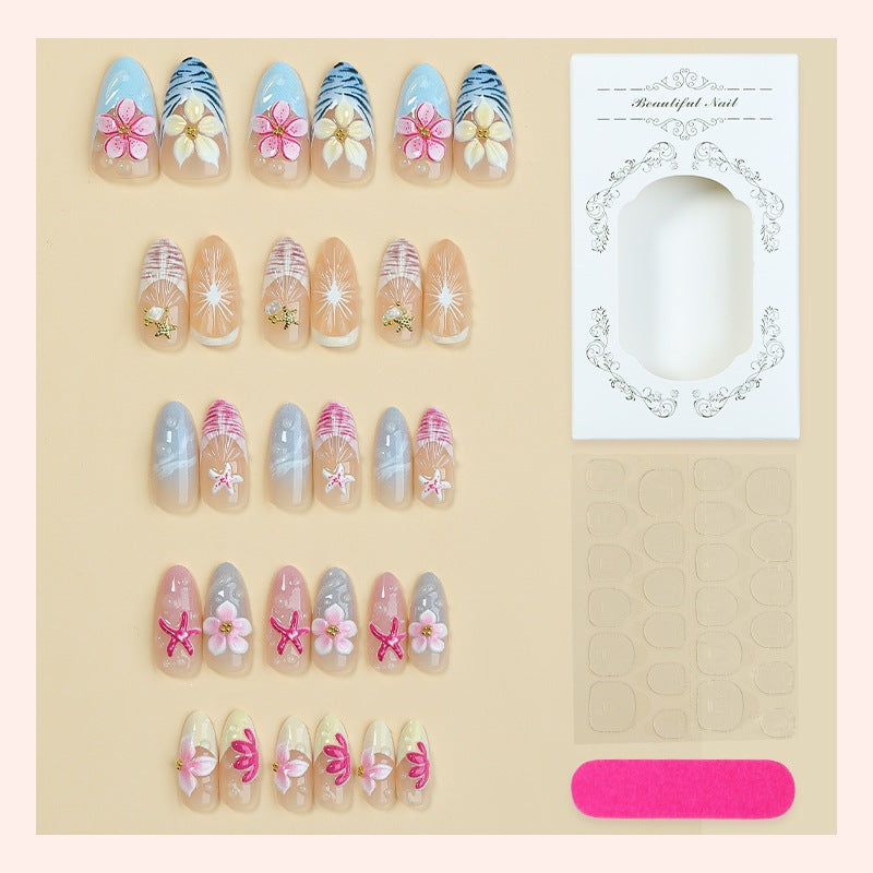 Artificial nail set with floral designs and elegant accents Kalsten