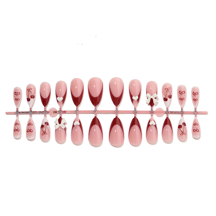 Fake nail set with playful motifs and elegant accents Kalsten