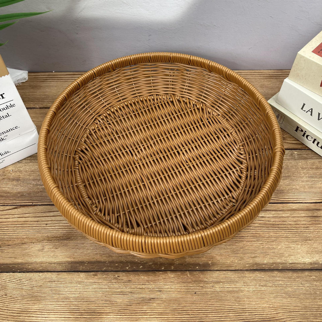 Women’s round serving basket made of woven rattan Kalsten
