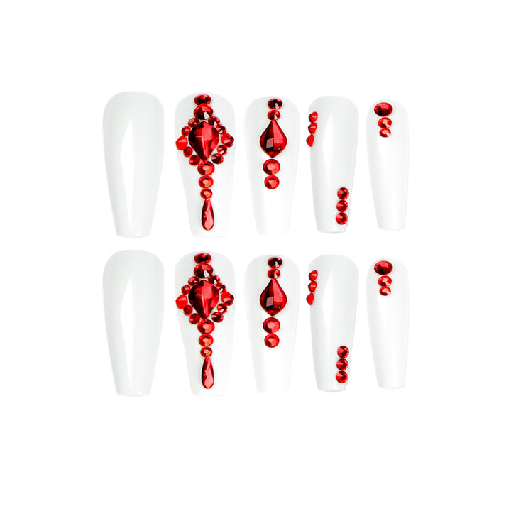 Artful nail extensions with glitter accents and elegant embellishments Kalsten