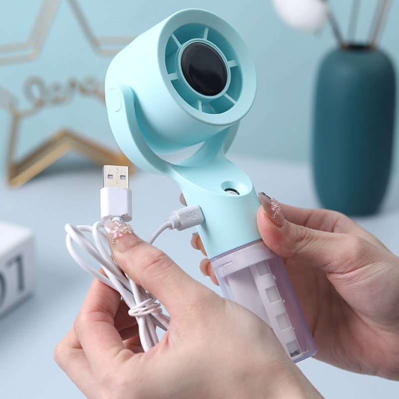 Cooling handheld misting fan with swivel air head detachable water reservoir and USB rechargeable battery Kalsten