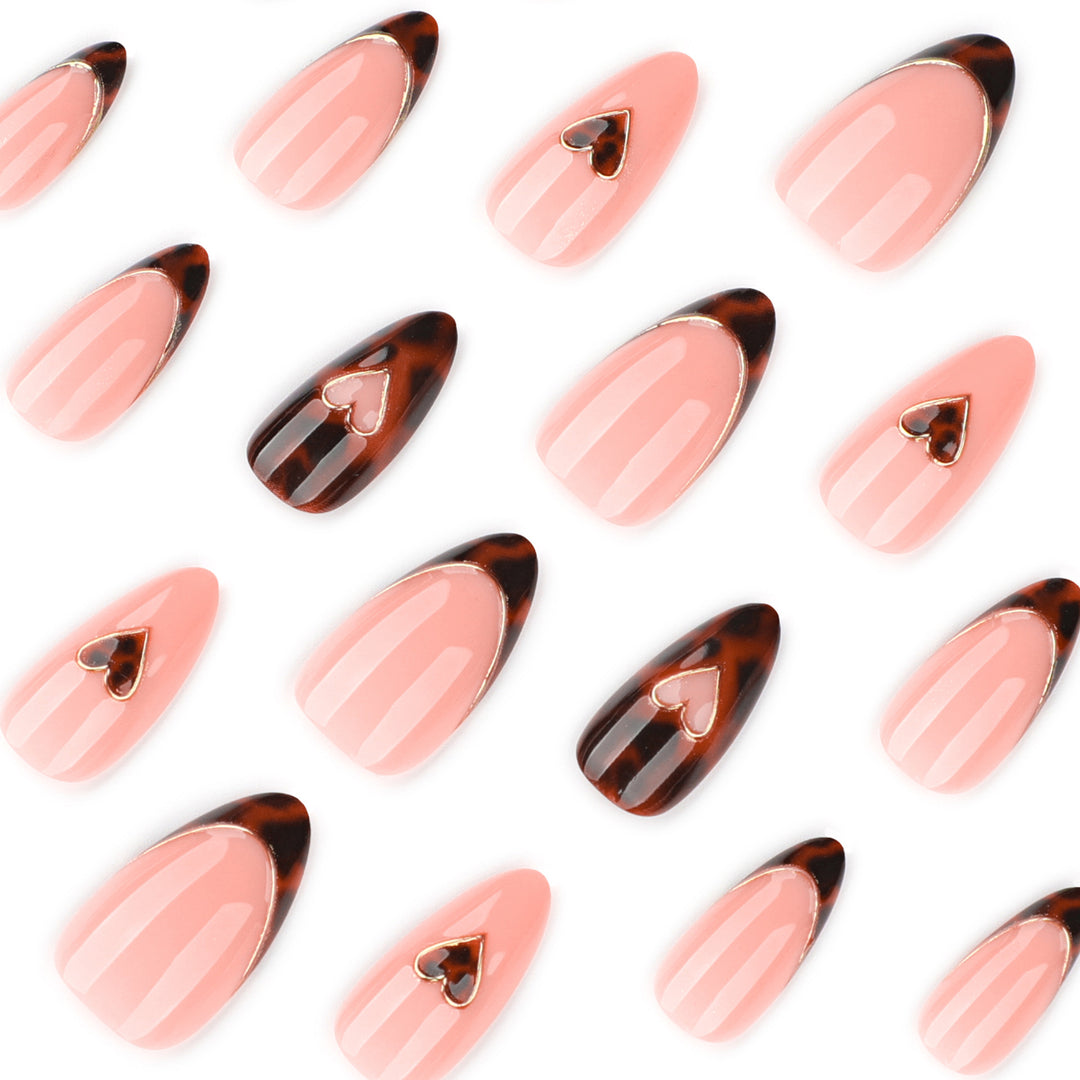 Artful stiletto nails with elegant heart design Kalsten