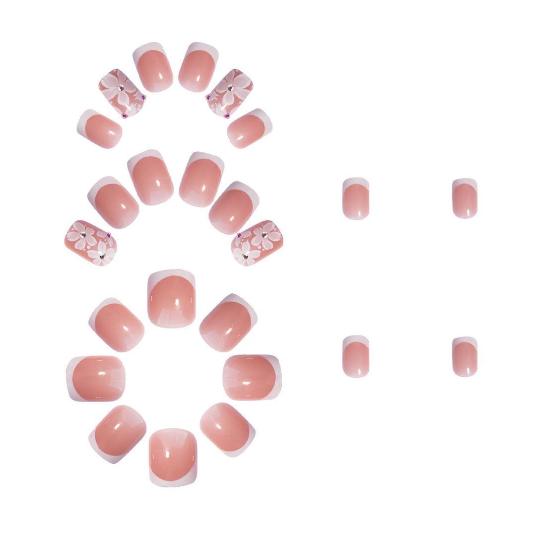 Artificial nail set with elegant French design and floral accents Kalsten