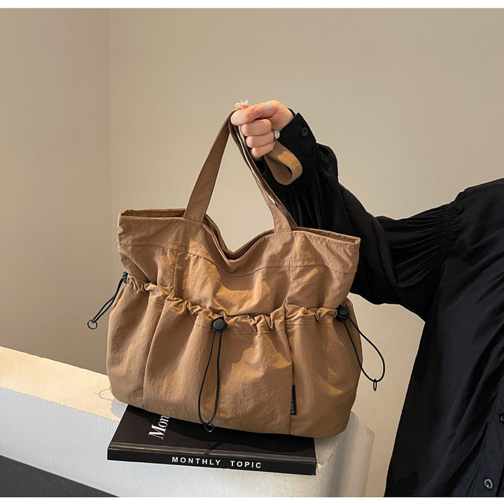 Practical everyday handbag with drawstring Kalsten