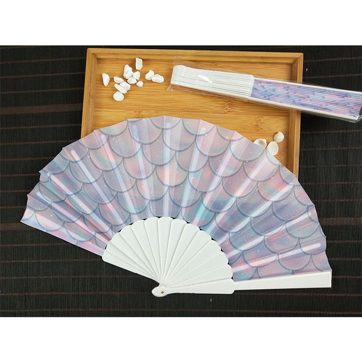 Women folding hand fan with shimmering scale pattern Kalsten