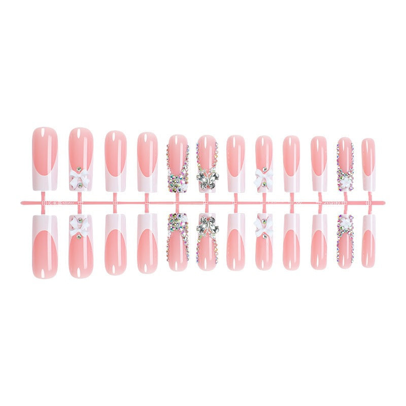 Artificial nail set with luxurious decorations and glitter accents Kalsten