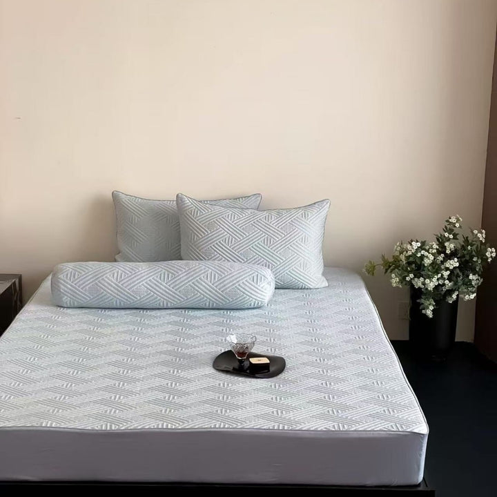 Quilted mattress topper set with non-slip underside, breathable microfiber and pillowcases