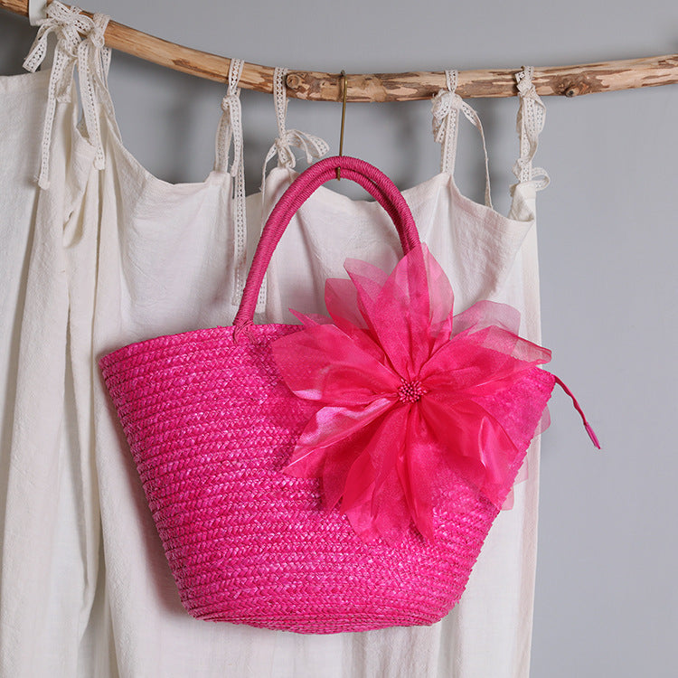 Stylish basket bag with eye-catching flower detail Kalsten