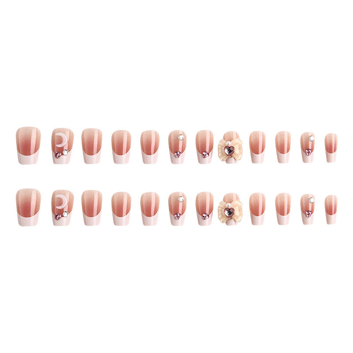 Artificial nail set with elegant floral decorations and glitter accents Kalsten