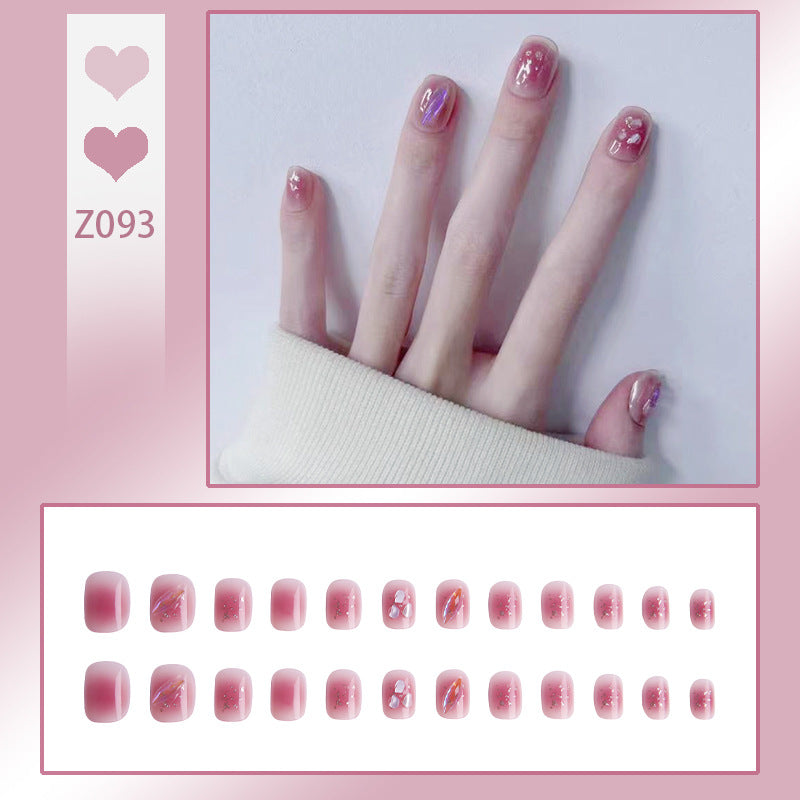 Artificial nails with delicate glitter design and floral accent Kalsten