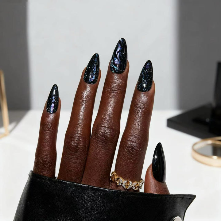 Artistic stiletto nails with shimmering effects Kalsten