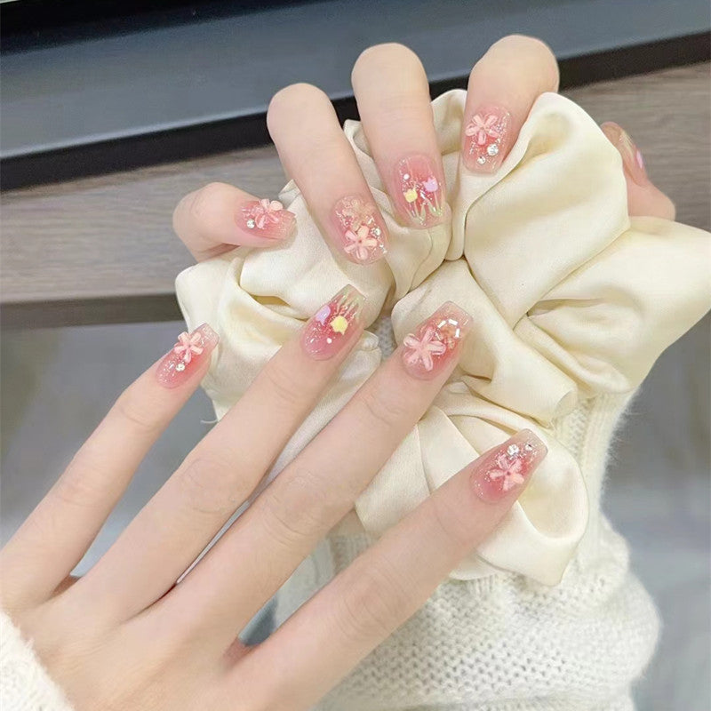 Artificial nails with floral design and glitter effects Kalsten