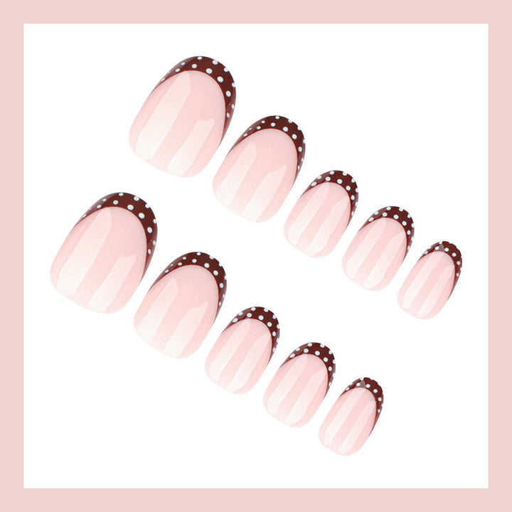 Artificial nail set with elegant French tips and subtle dots Kalsten