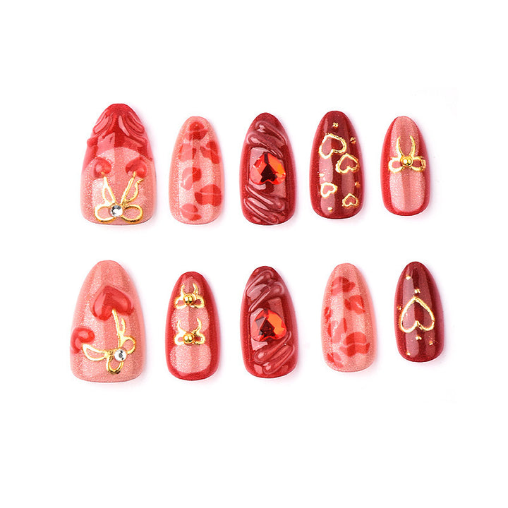 Festive artificial nails with romantic heart designs Kalsten