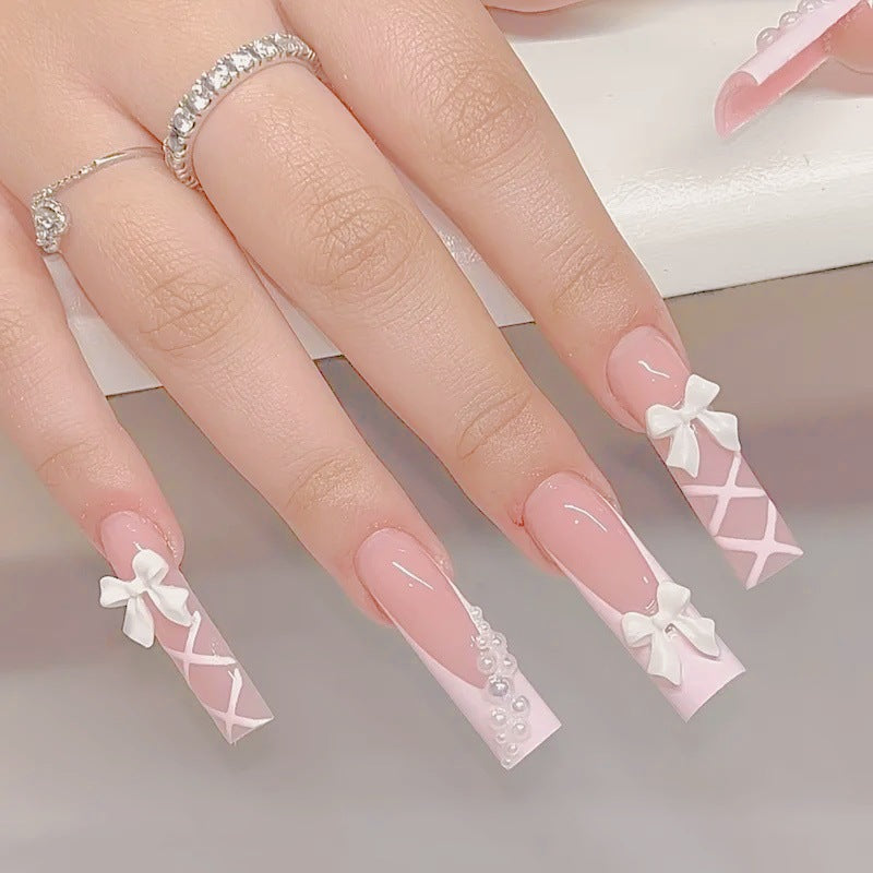 Artificial nail set with elegant 3D bows and pearl embellishments Kalsten
