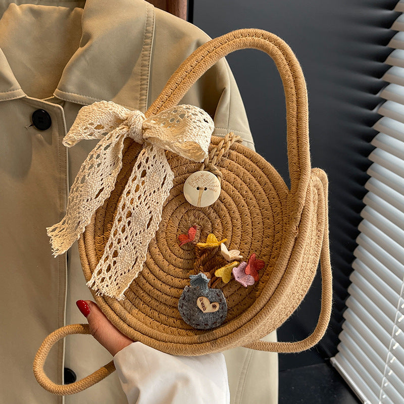 Handcrafted Floral Accent Straw Bag