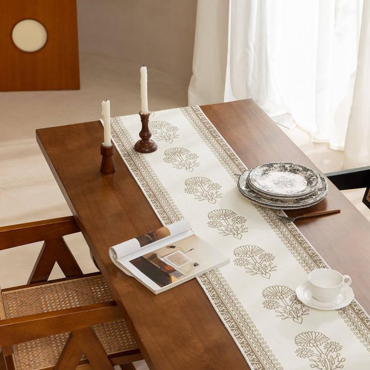 Woven decorative table runner with floral medallion borders and fringes Kalsten